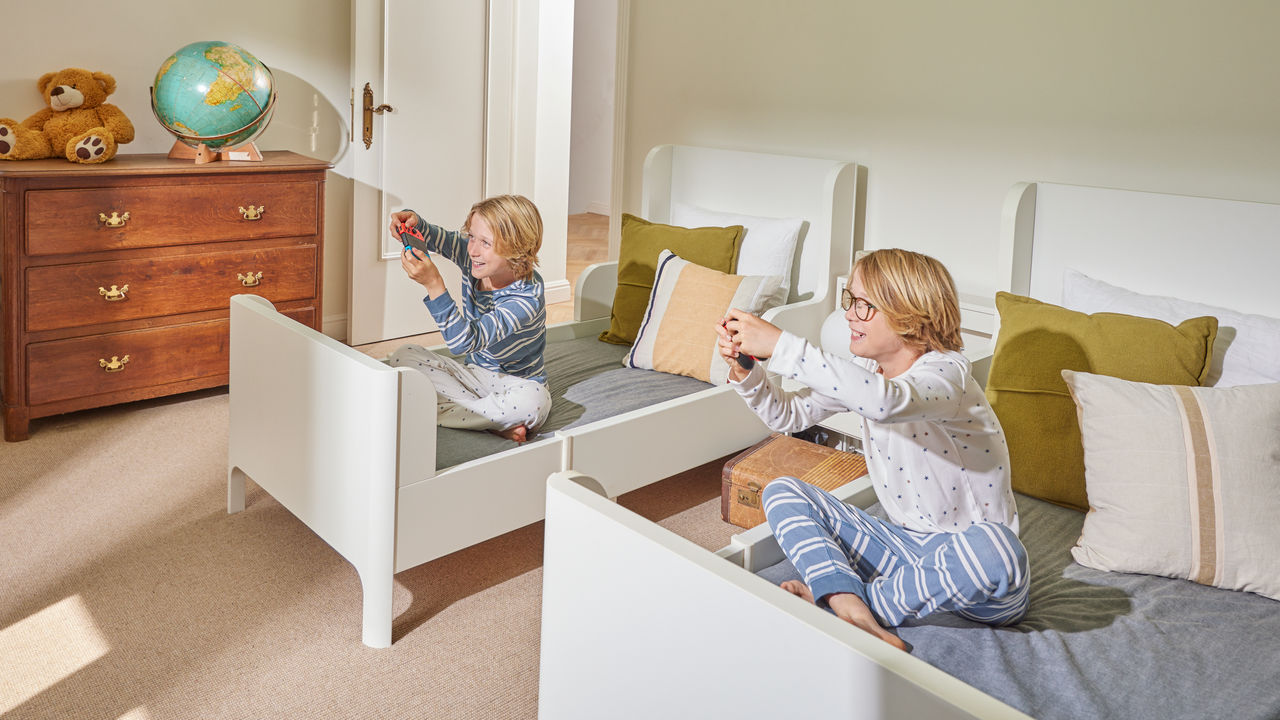 Brothers playing in their room